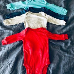 4 Long-sleeved Onesies in solid colors